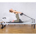 Align-Pilates C8-Pro Reformer Model Side view lifestyle pose