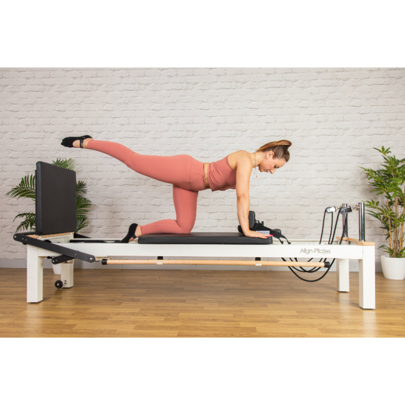 Align-Pilates C8-S Reformer Lifestyle Model-Side