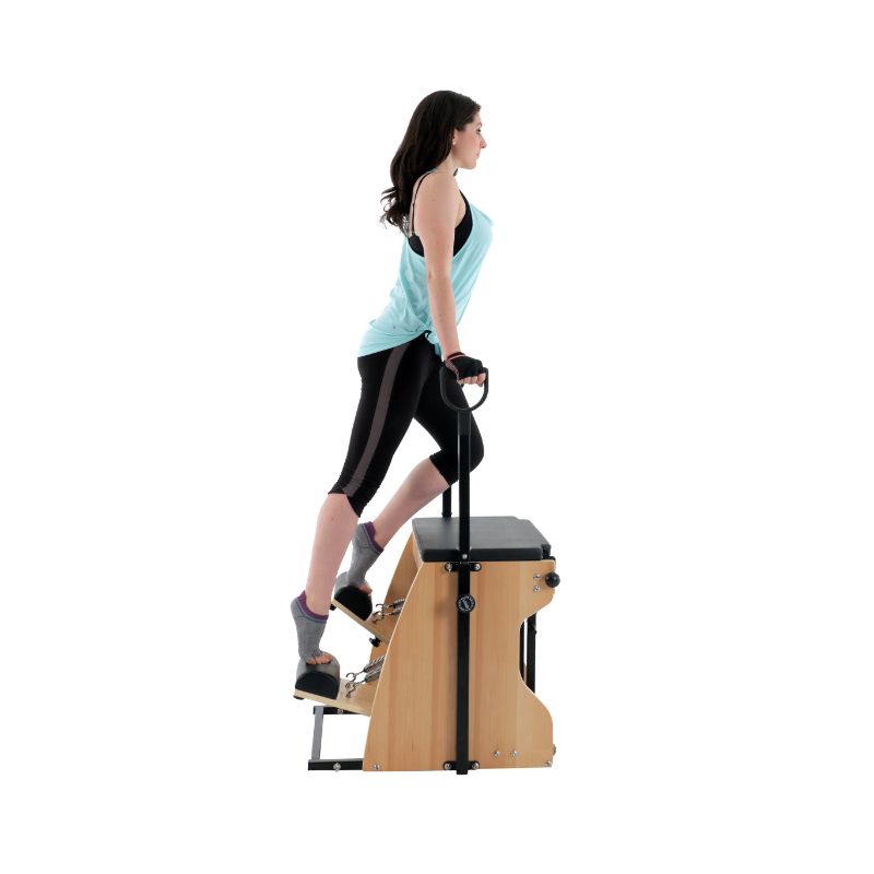 Align-Pilates-Combo-Chair-With-Model-Side-Standing