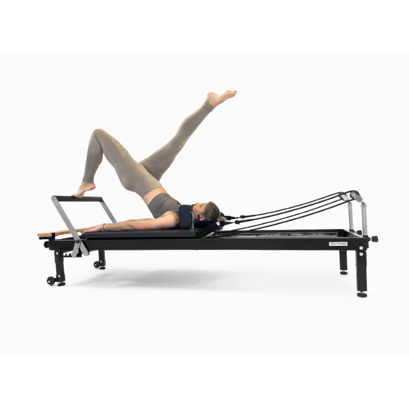 Align-Pilates H1 Home Pilates Reformer model foot bar exercise side view white background