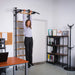 BenchK Floor-to-Ceiling Swedish Ladder in black model hanging in office