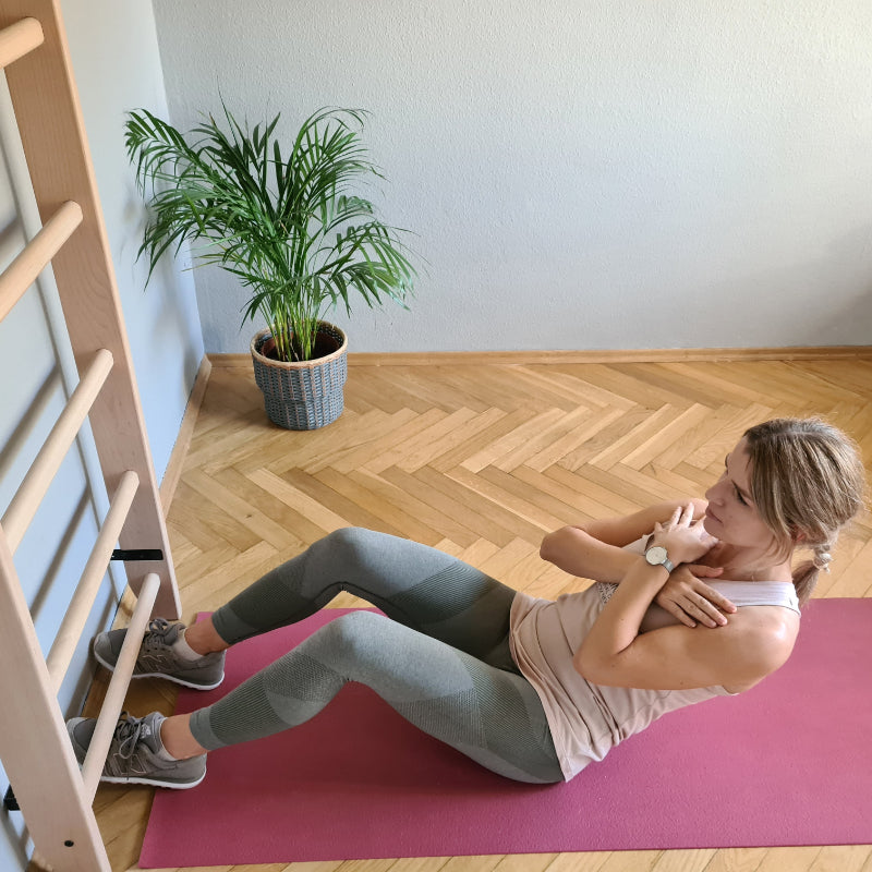 BenchK Wood Swedish Ladder model doing sit ups