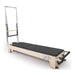 Elina Pilates Elite Wood Reformer With Tower black upholstery diagonal white background