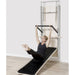 Elina Pilates Wall Board ONNE by eva espuelas fully equipped with ballet bar and mat table diagonal view legs extended