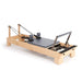 Elina Pilates Wood Reformer Grey Upholstery Diagonal White Background