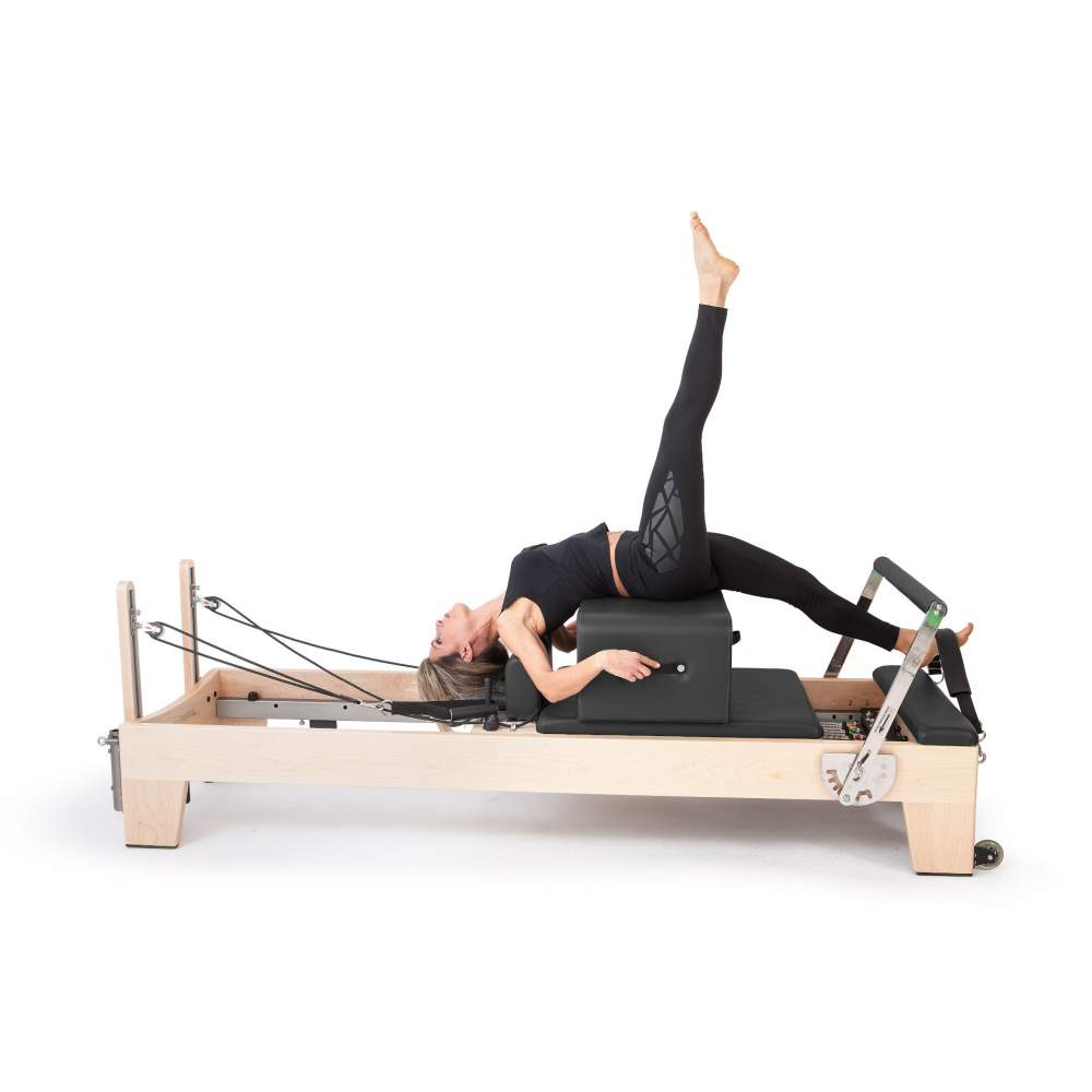 Elina Pilates elite wood reformer grey upholstery for pilates model leg circle white background