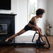 Lagree Fitness Microformer model stretching home workout sideview